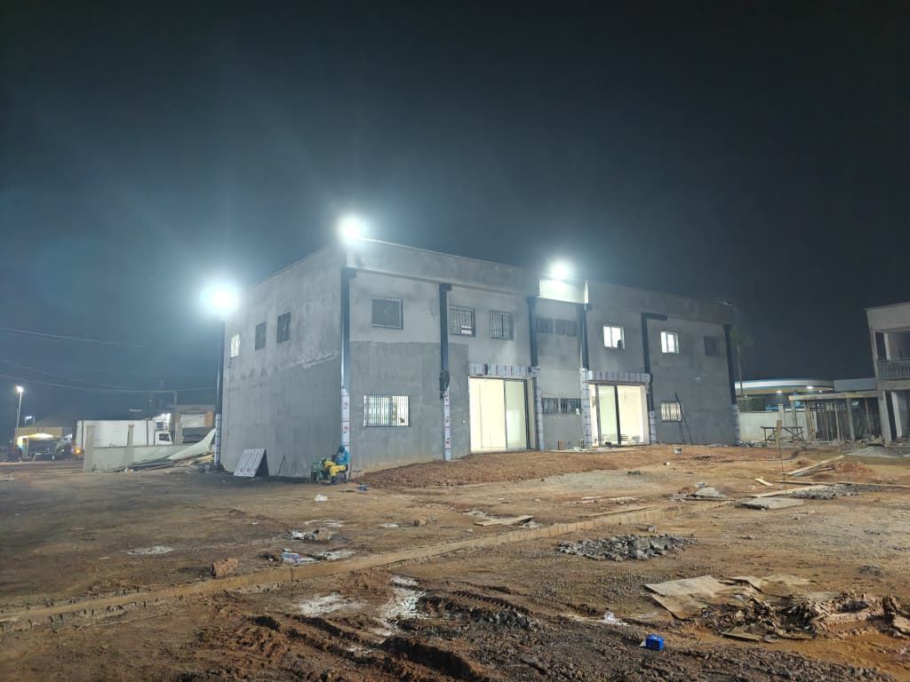 LED outdoor lighting — industrial building at night