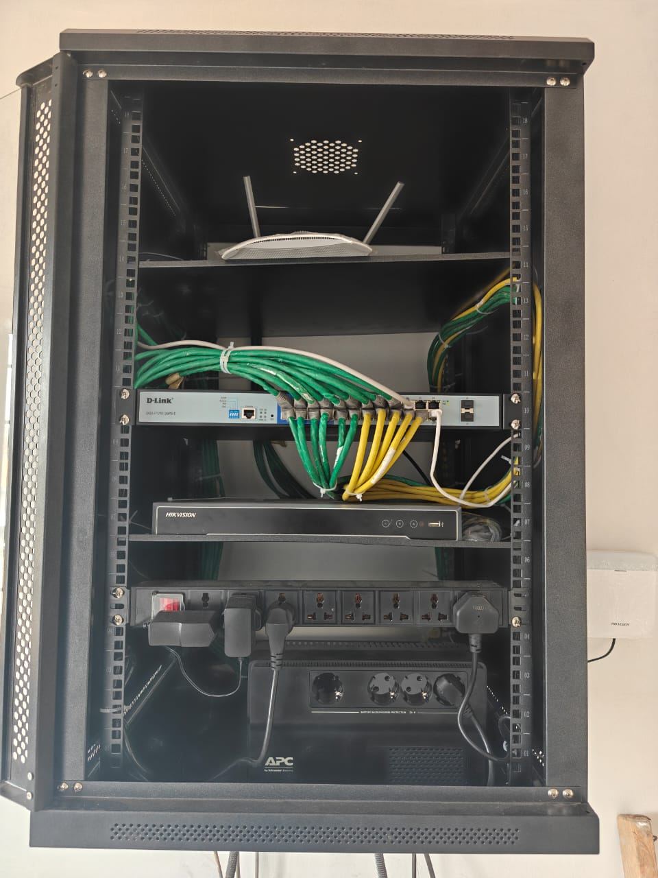 Equipped IT network rack — switch, router, APC UPS
